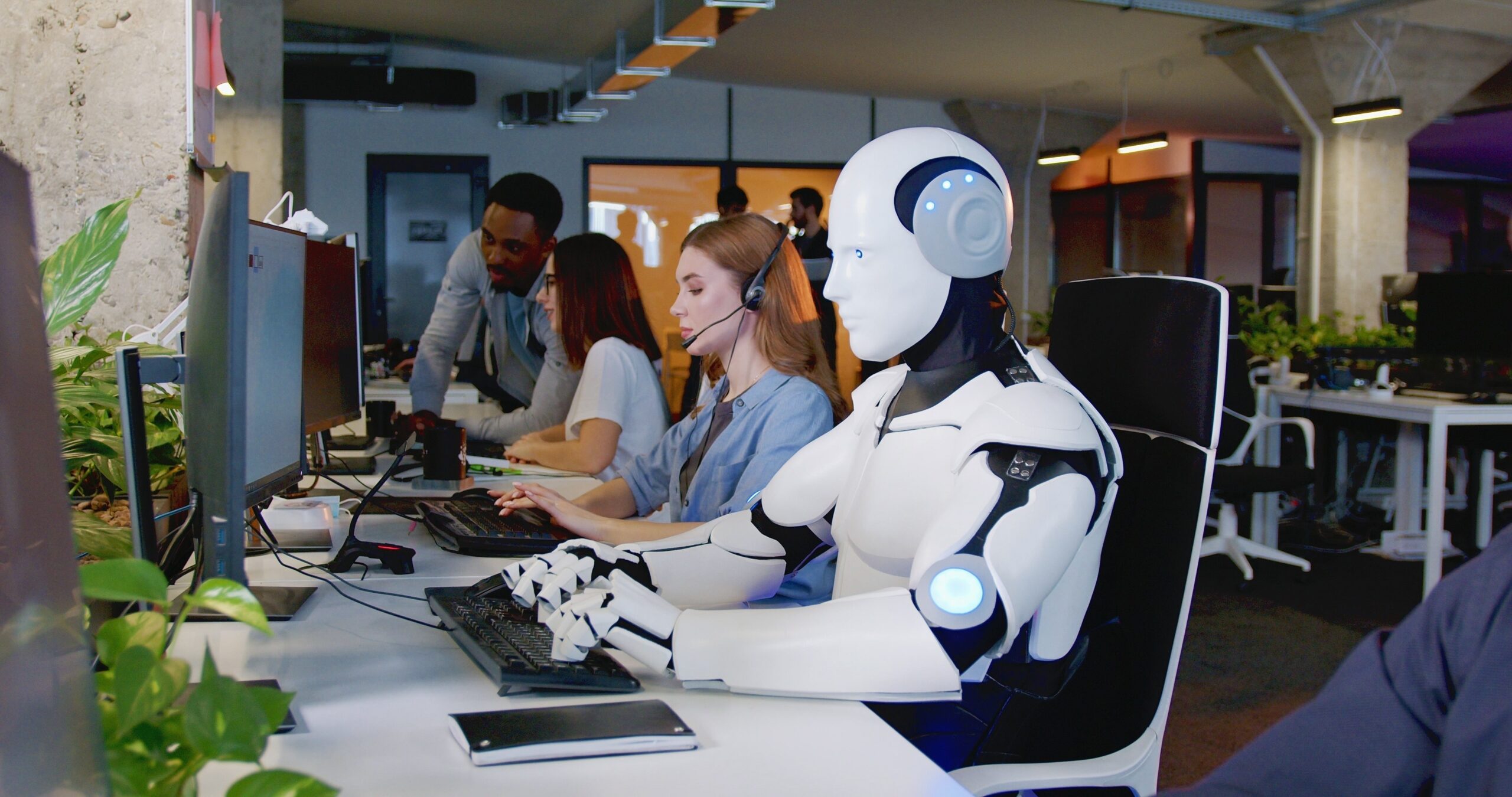 Robot,Working,At,Computer,Among,People